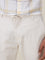 ETA Off-White Cotton Slim-Fit Mid-Rise Chinos