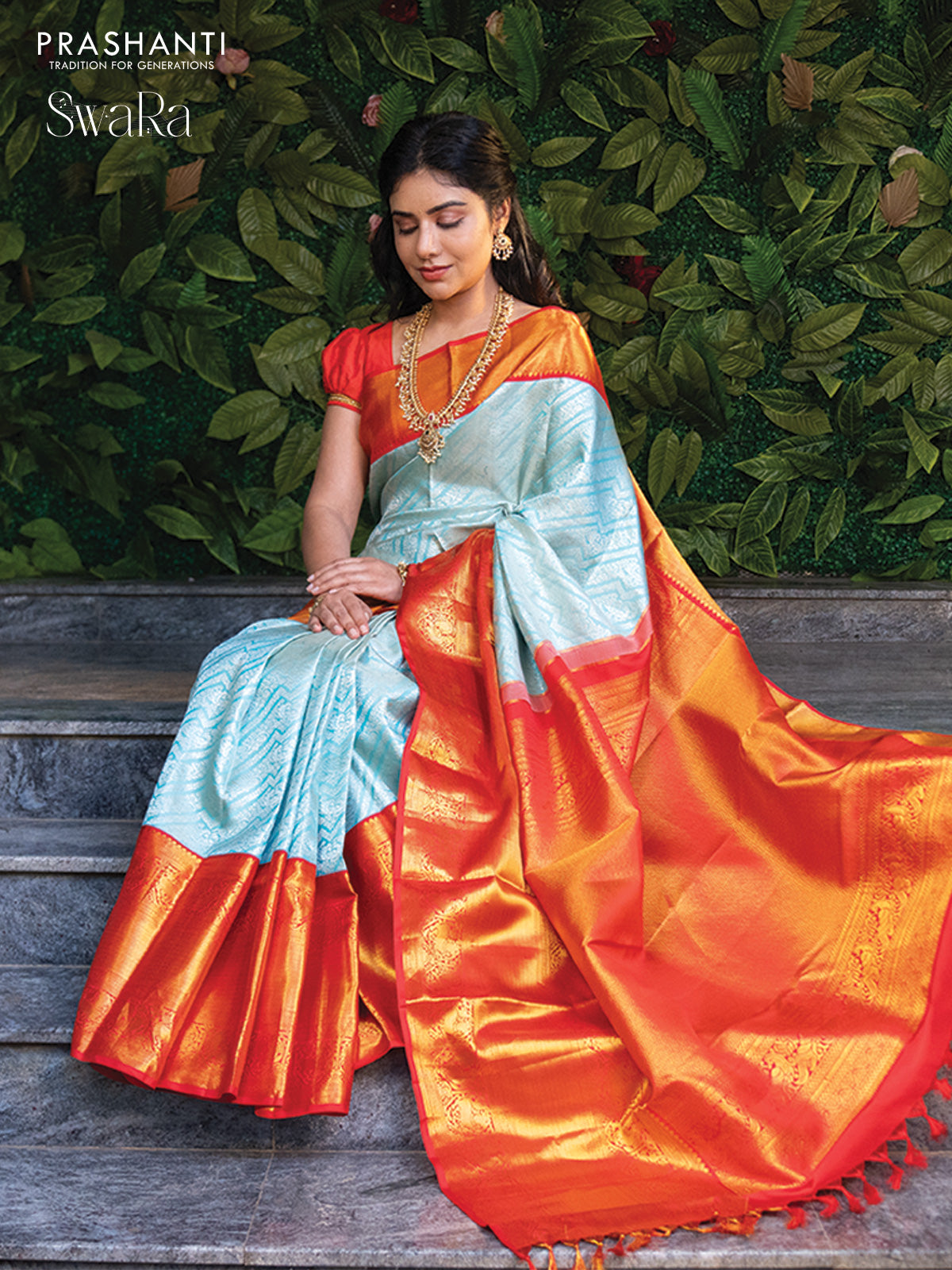 Pure kanjivaram silk saree light blue and red with allover silver zari woven brocade weaves and golden zari woven border