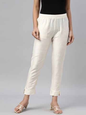 Women Cream Solid Mid Rise Metallic Pants