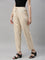 Women Solid Light Beige Mid Rise Casual Pants