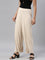 Women Solid Light Beige Viscose Mid Rise Knit Palazzos