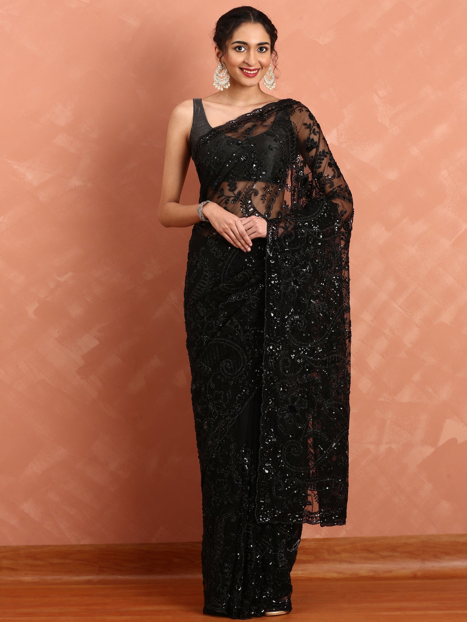 Black net saree with sequin heavy hand embroidery