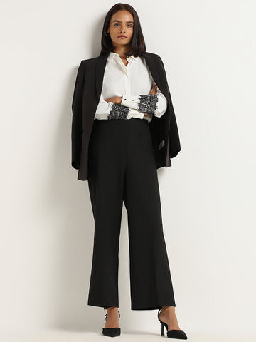 Wardrobe Black Self-Patterned Trousers