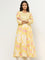 Utsa Yellow Floral Printed A-line Cotton Kurta