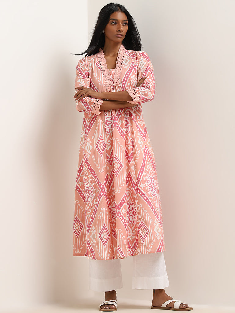 Utsa Peach Ikat Printed A-Line Kurta