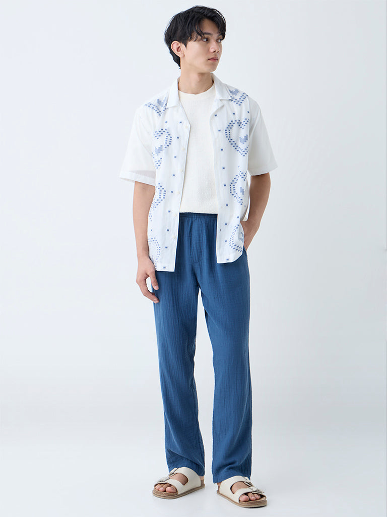 ETA Indigo Textured Relaxed-Fit Mid-Rise Cotton Trousers
