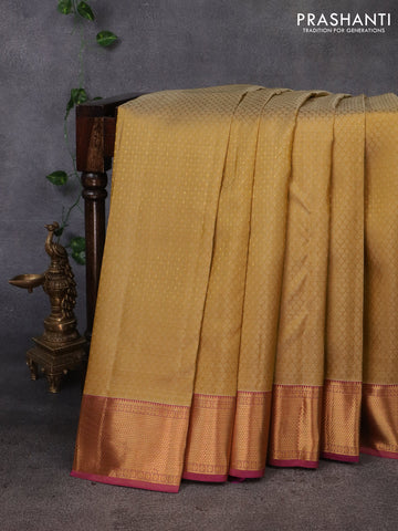 Pure kanchipuram silk saree pale yellow and purple with allover self emboss & zari buttas and zari woven border