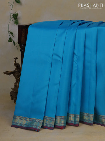 Pure kanchipuram silk saree light blue with plain body and zari woven border