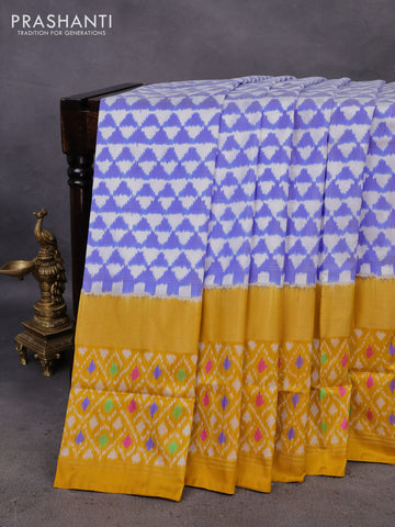 Pochampally silk saree blue shade and mustard yellow with allover ikat prints and zari woven ikat style border