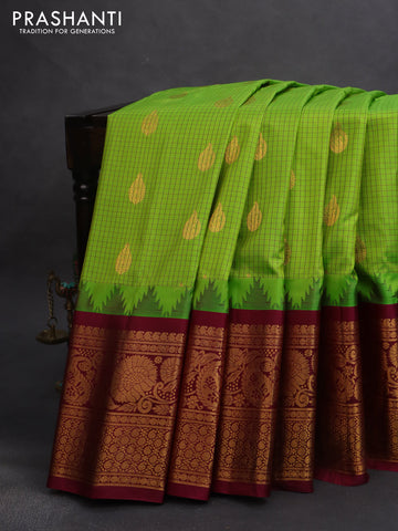 Pure gadwal silk saree light green and maroon with allover checked pattern & zari buttas and temple design zari woven border