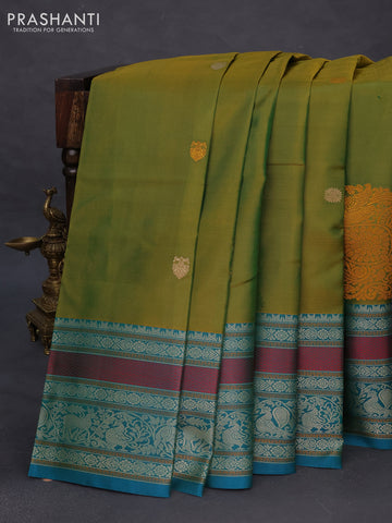 Pure kanchipuram silk saree dual shade of green and teal green shade with thread woven buttas and long thread woven border