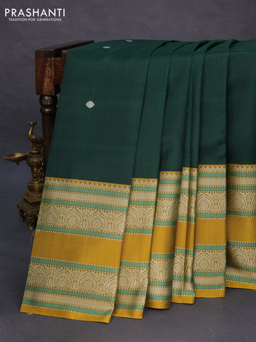 Pure kanchipuram silk saree bottle green and mustard yellow with thread woven buttas and long rettapet thread woven border