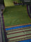 Pure kanchipuram silk saree dual shade of green and dual shade of purple with thread woven buttas and thread woven border