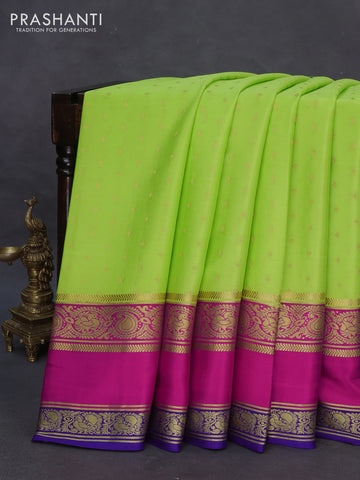 Pure mysore silk saree fluorescent green and pink blue with allover zari woven buttas andd rettapet zari woven border