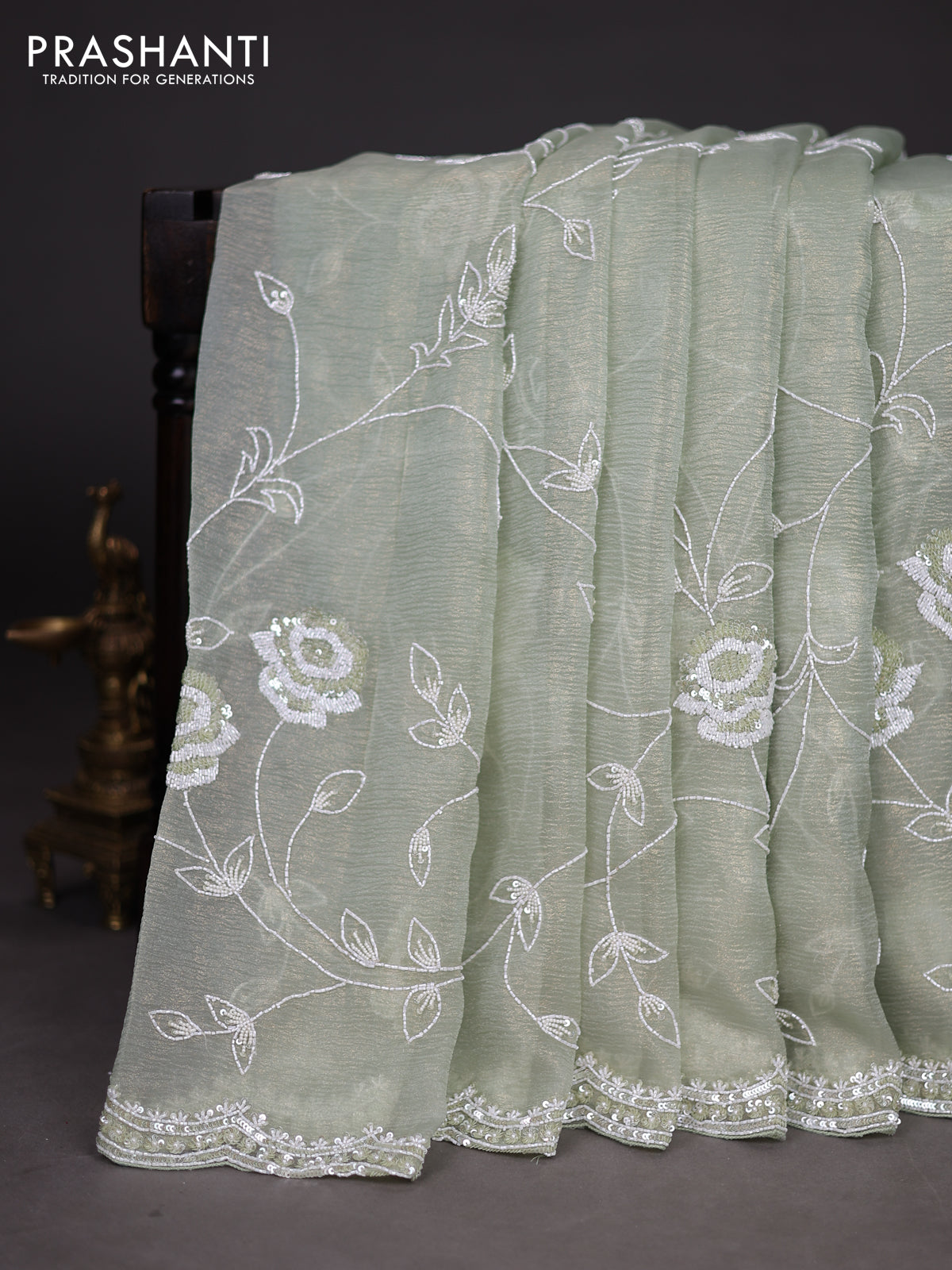 Crush tissue saree pastel green with allover sequin & cut beaded work