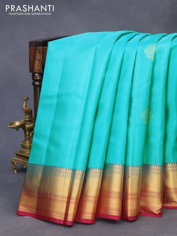 Pure kanchipuram silk saree teal blue and maroon with zari woven buttas and zari woven border