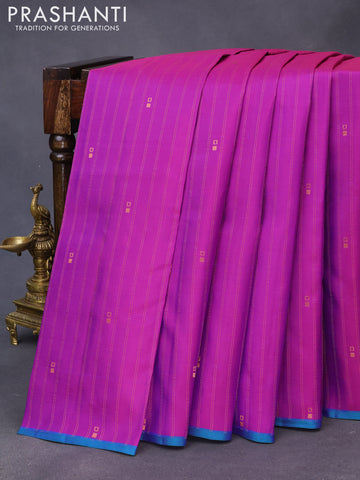 Pure kanchipuram silk saree purple and teal green with allover copper zari weaves & buttas and thread woven piping border