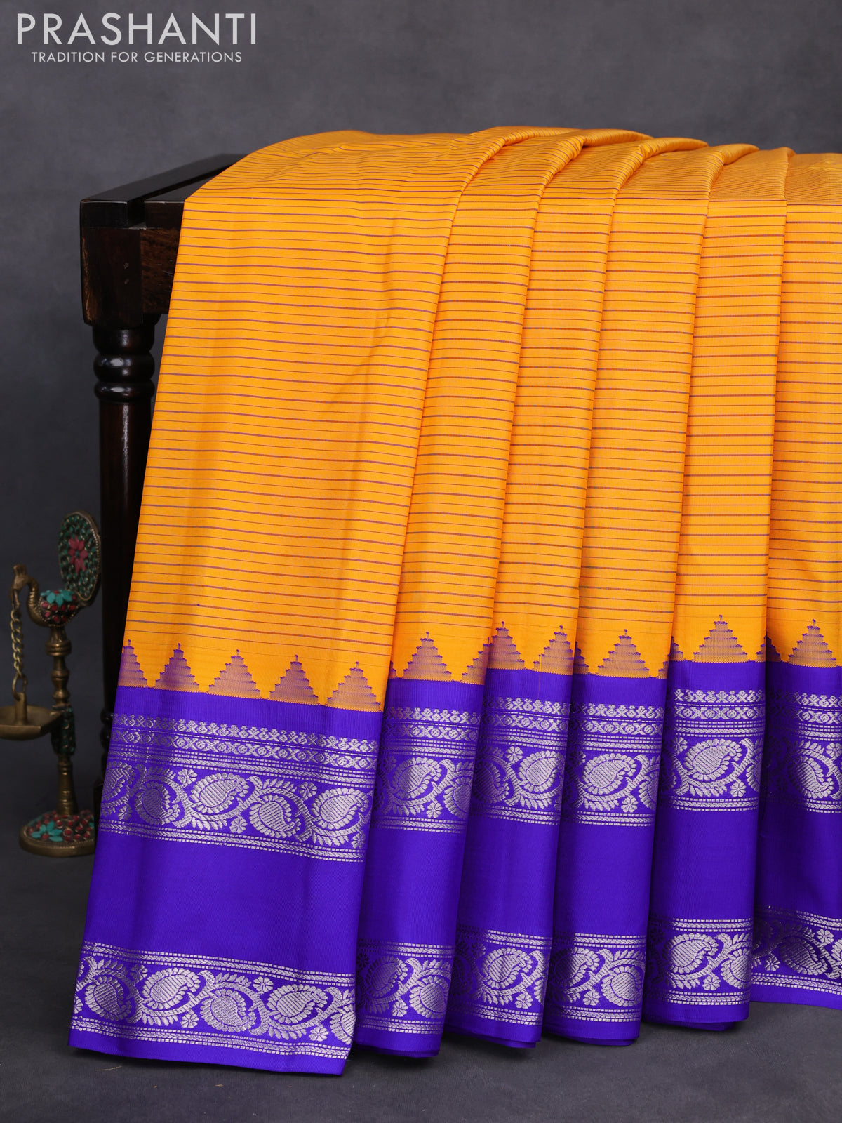 Pure gadwal silk saree mango yellow and blue with allover stripes pattern and temple design rettapet silver zari woven border