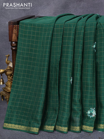 Semi crepe saree green with allover zari checked pattern & embroidery work buttas and small zari woven border