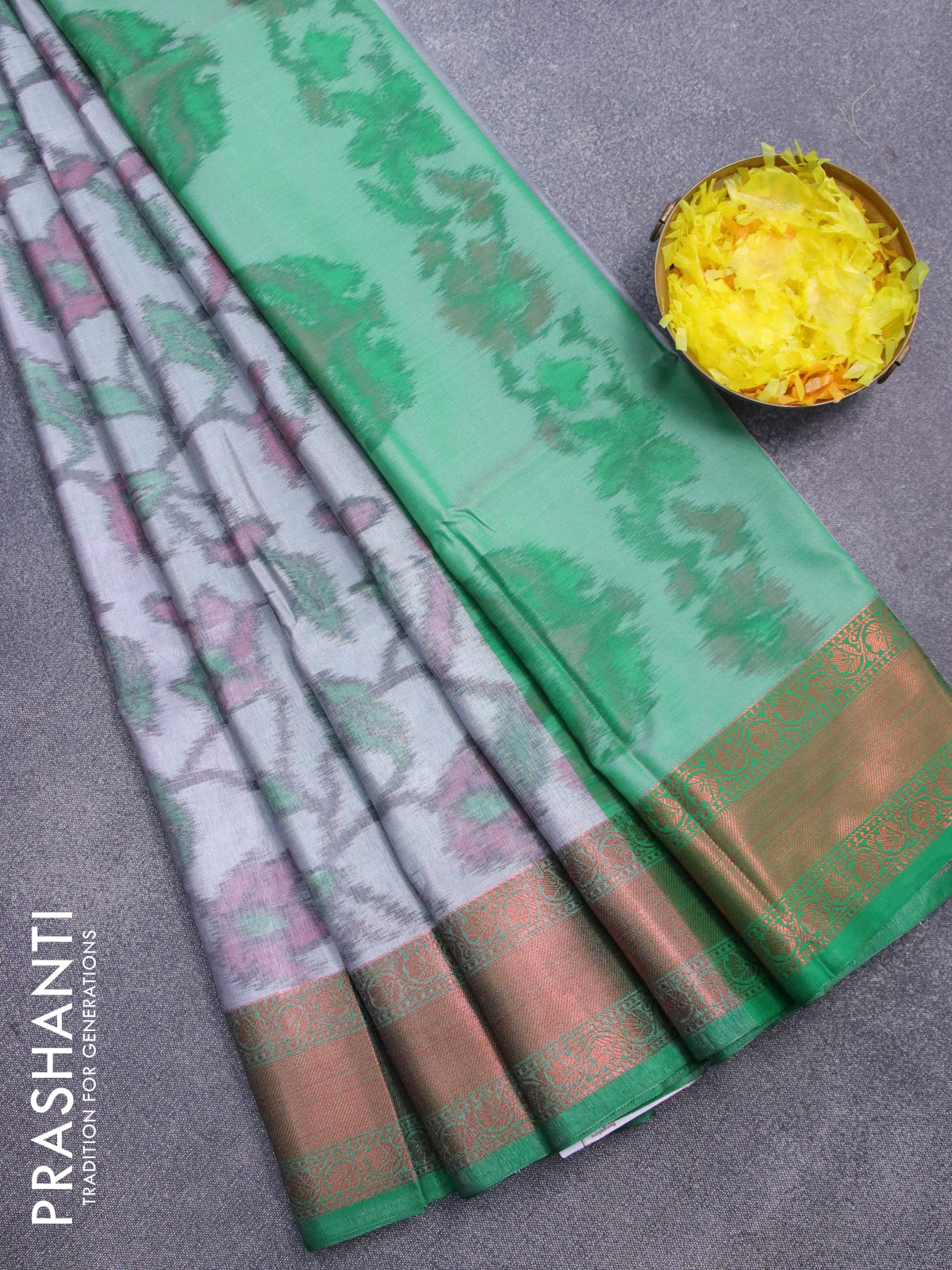 Banarasi semi tussar saree grey and green with allover ikat weaves and copper zari woven border