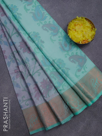 Banarasi semi tussar saree dual shade of grey and teal green with allover ikat weaves and copper zari woven border