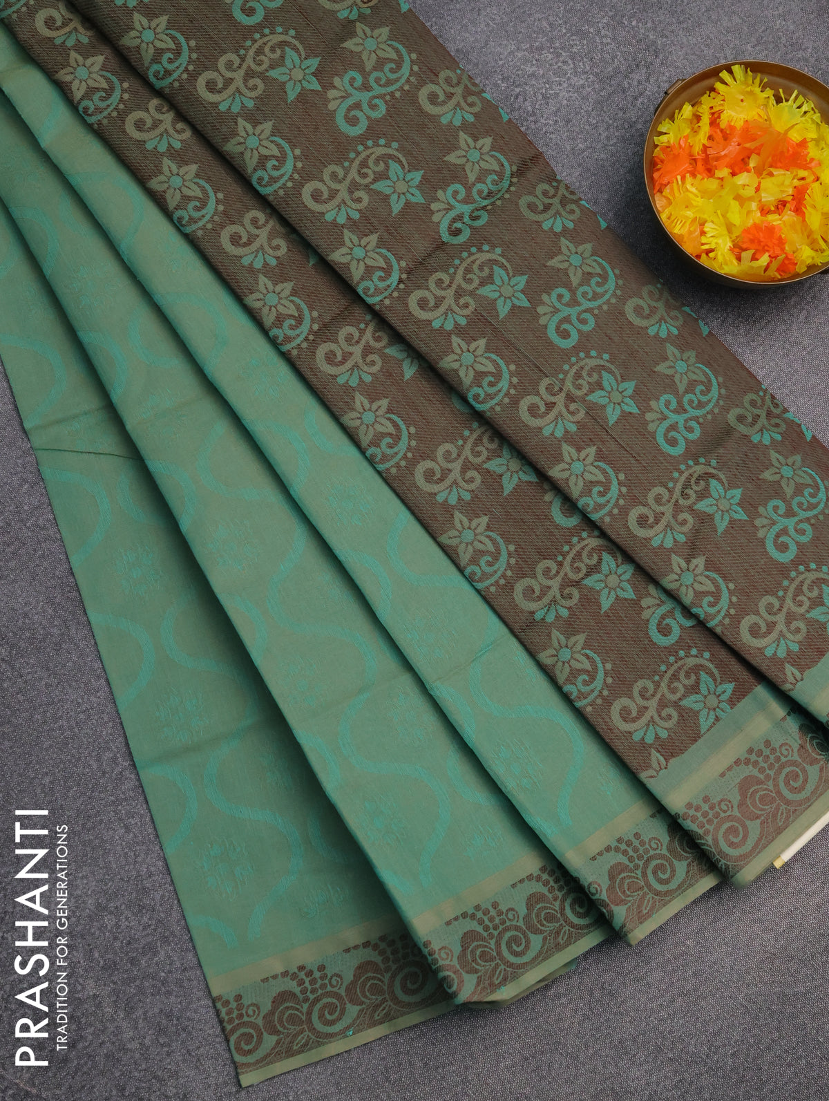 Coimbatore cotton saree dual shade of teal blue and coffee brown with allover self emboss and thread woven border