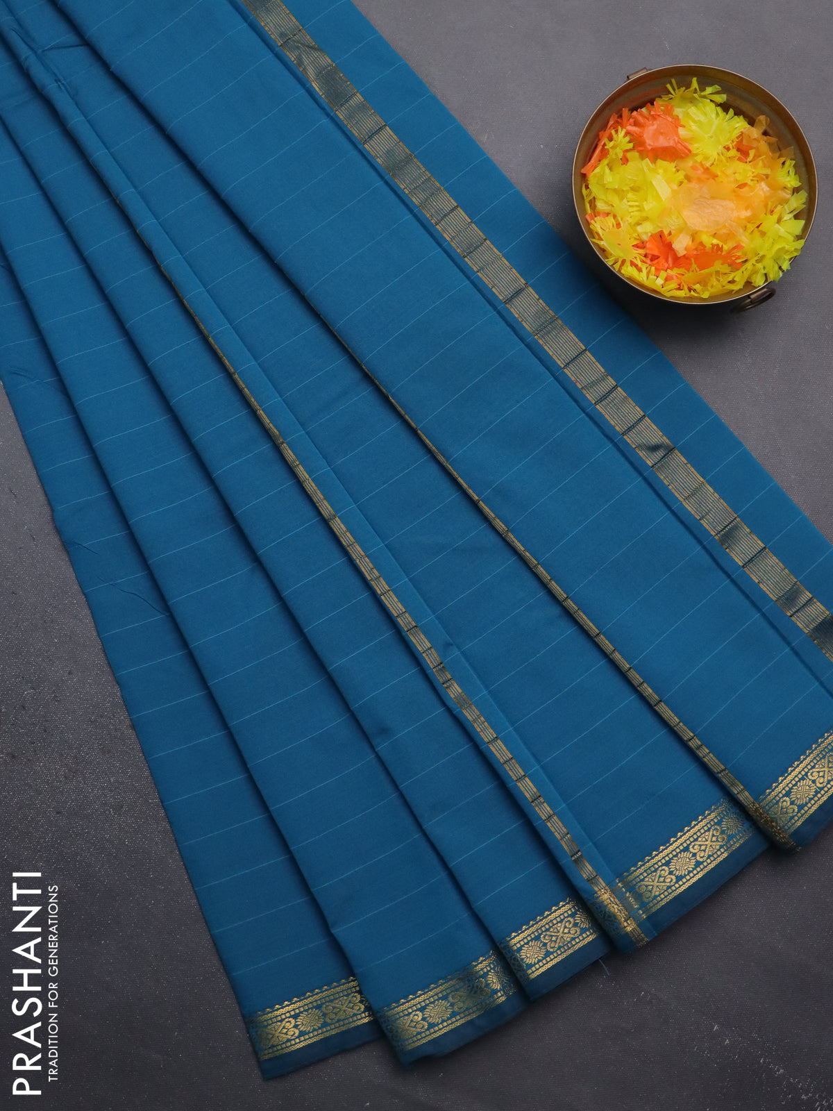 Arani semi silk saree peacock blue with plain body and zari woven border