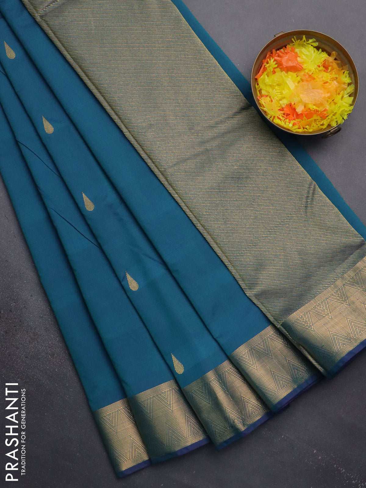 Arani semi silk saree dual shade of teal green with zari woven thilak buttas and zari woven border