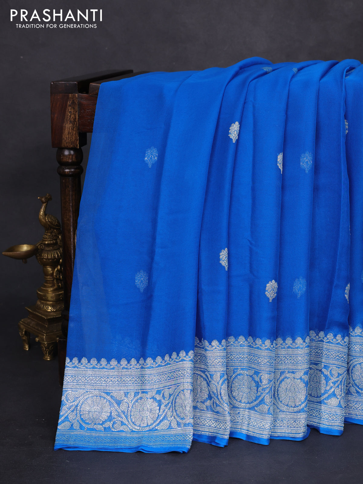 Banarasi chiffon silk saree cs blue with silver zari woven buttas and silver zari woven border