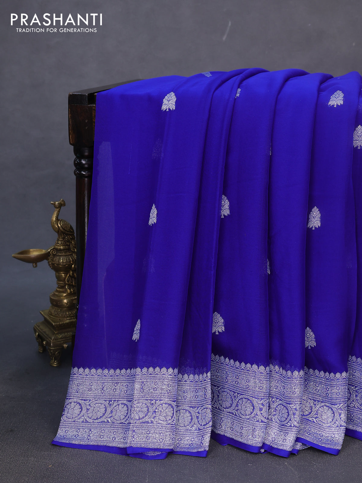 Banarasi chiffon silk saree royal blue with silver zari woven buttas and silver zari woven border