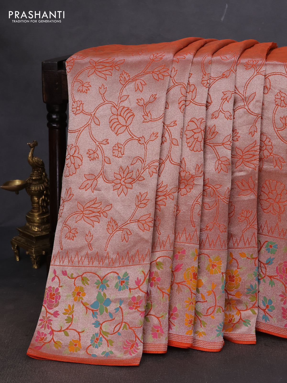 Banarasi semi raw silk saree orange with allover silver zari woven floral weaves and floral design paithani border