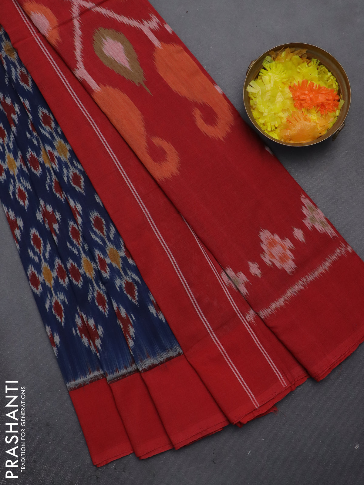 Ikat cotton saree peacock blue and red with allover ikat weaves and simple border