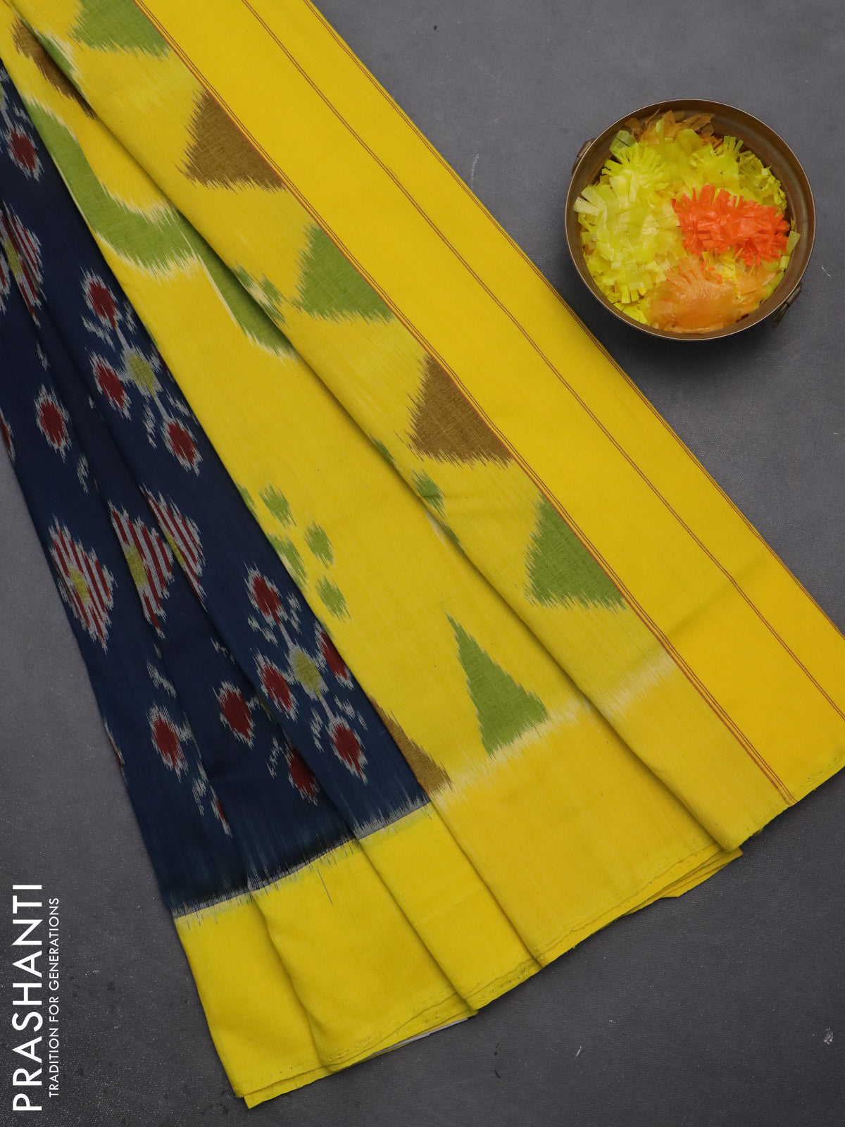 Ikat cotton saree peacock blue and yellow with allover ikat butta weaves and simple border