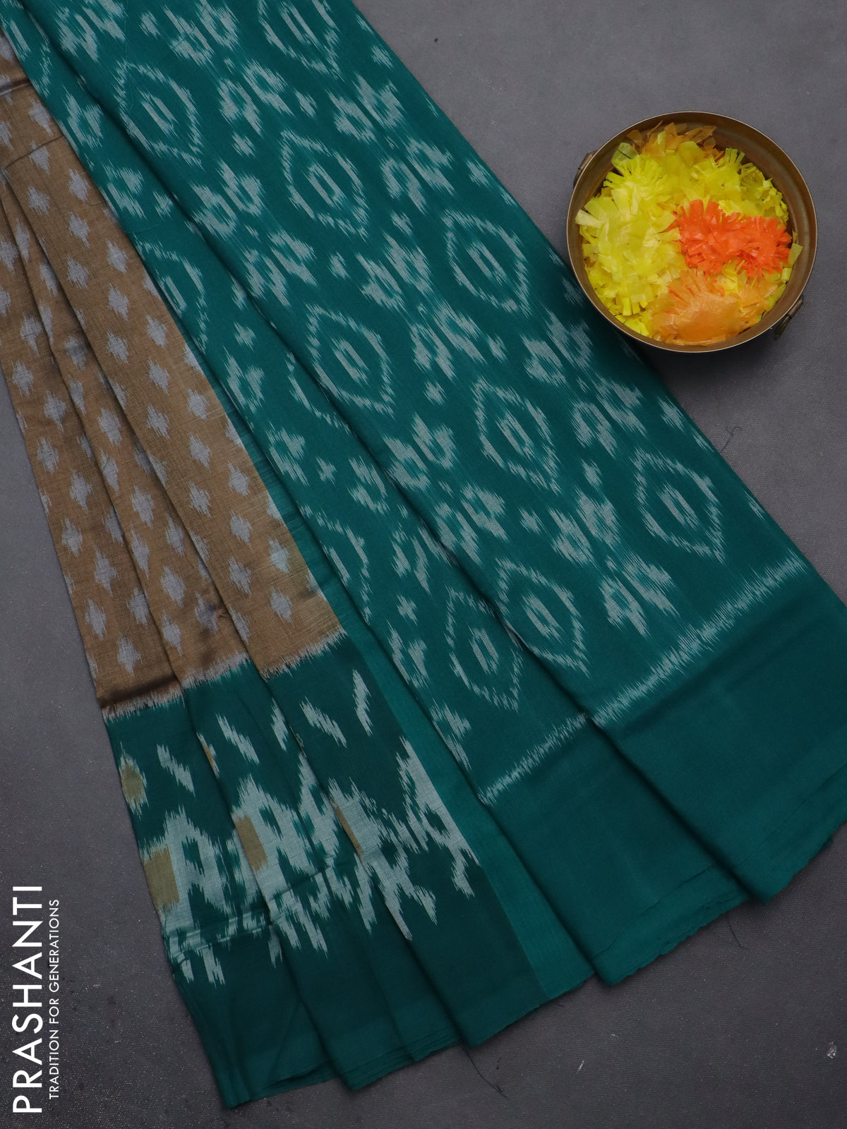 Ikat cotton saree dark sandal and teal green with allover ikat butta weaves and long ikat style border