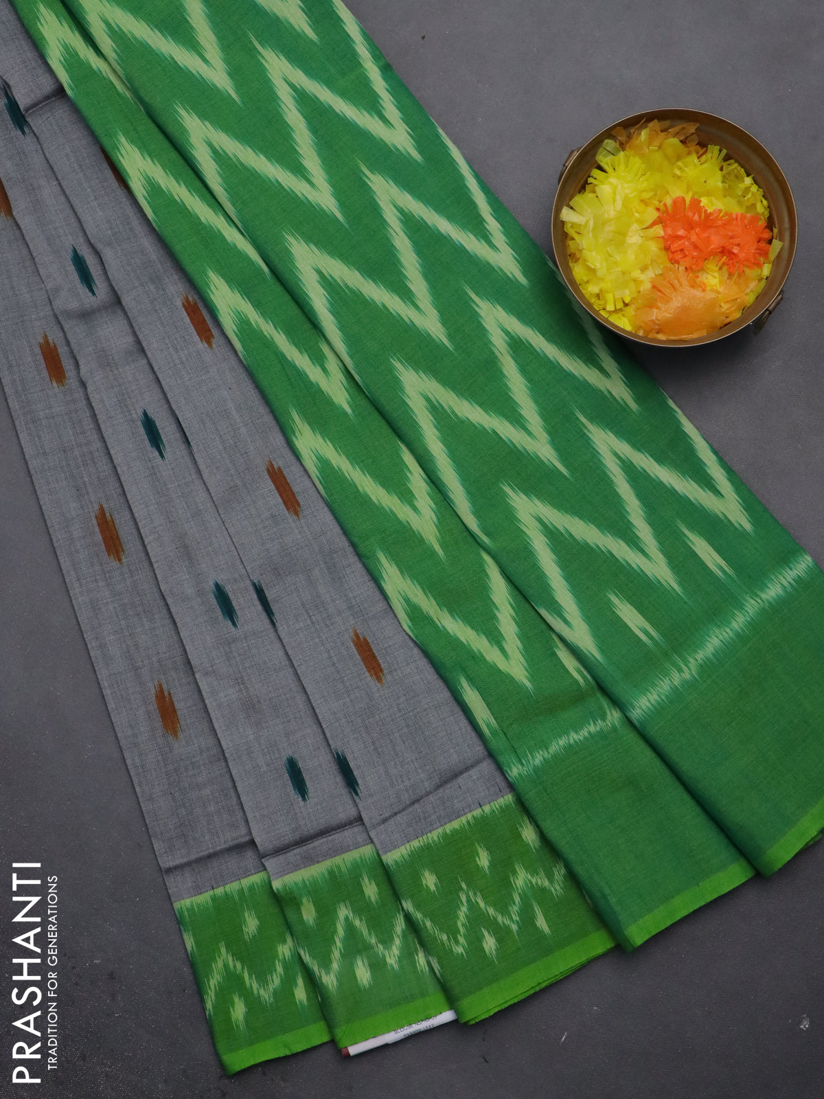 Ikat cotton saree grey and green with allover ikat butta weaves and ikat style border