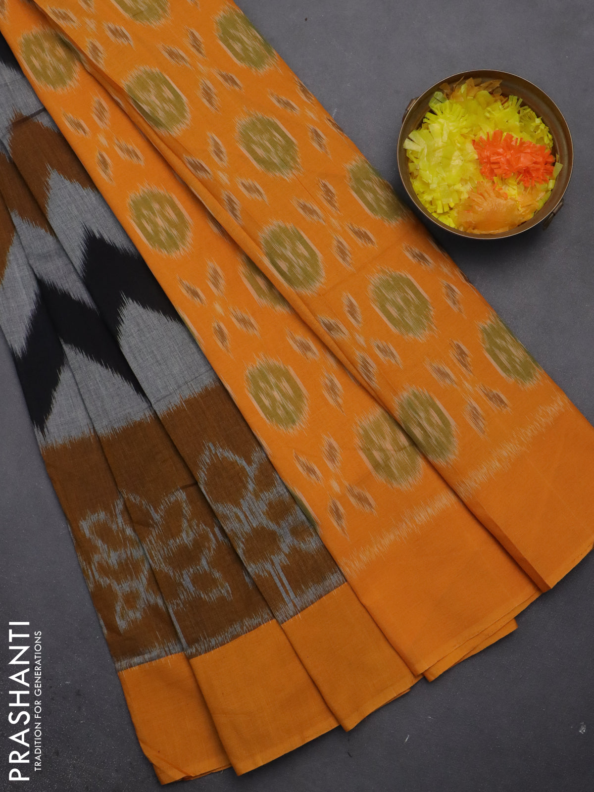 Ikat cotton saree multi colour and mustard shade with allover zig zag weaves and simple border