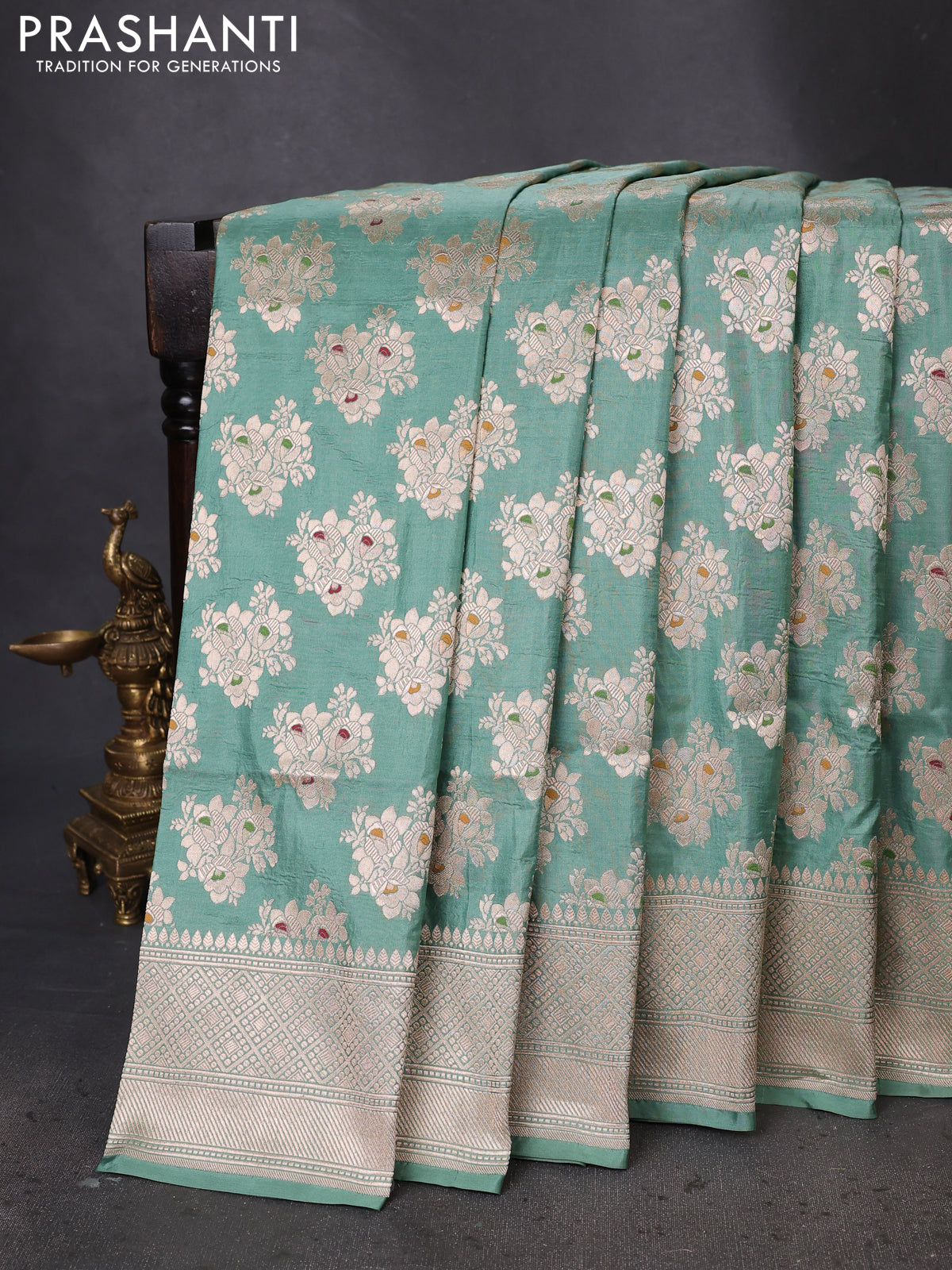 Banarasi uppada silk saree pastel green with allover zari woven butta weaves and zari woven border
