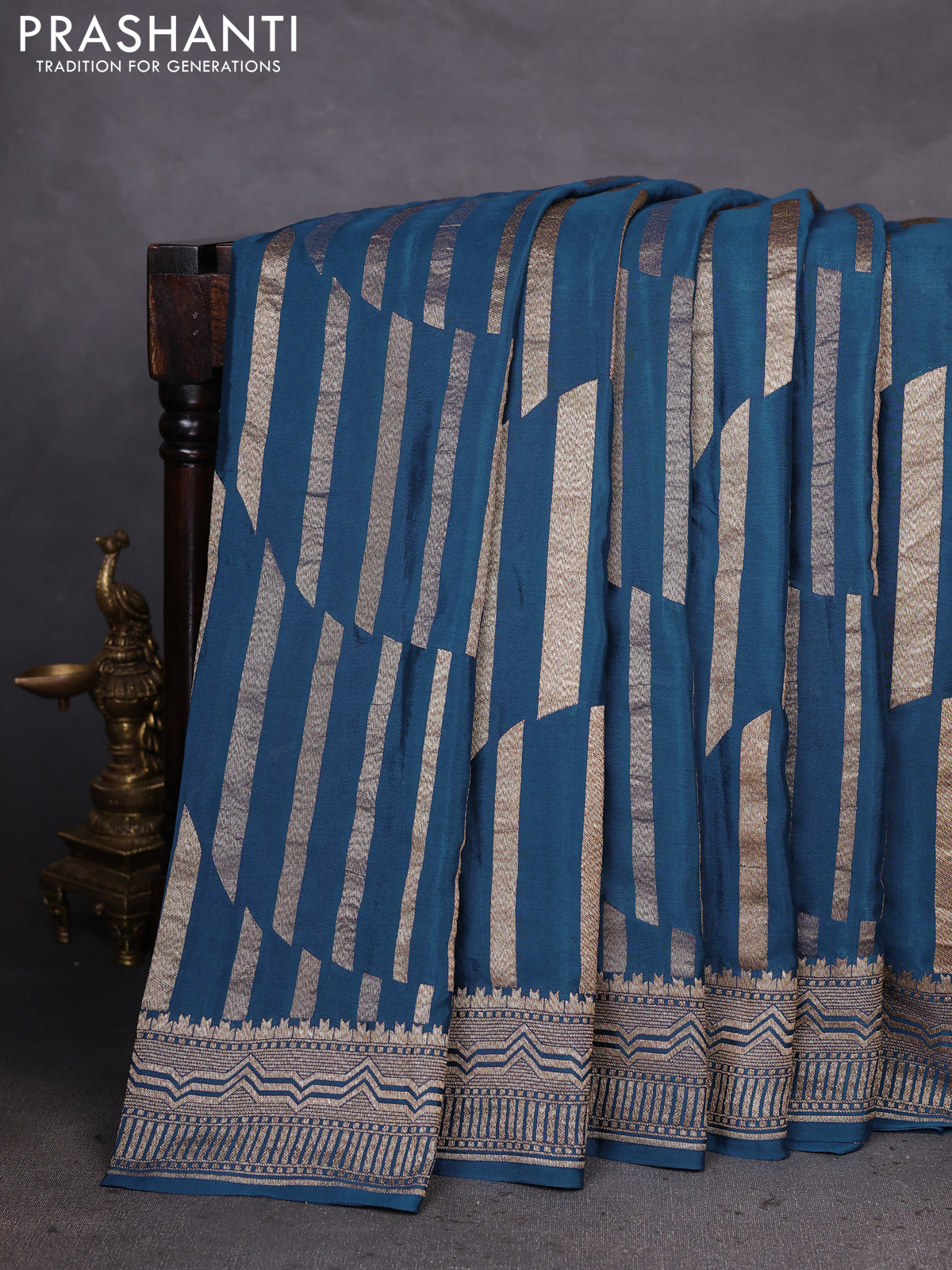 Banarasi crepe saree peacock blue with allover geometric weaves and woven border