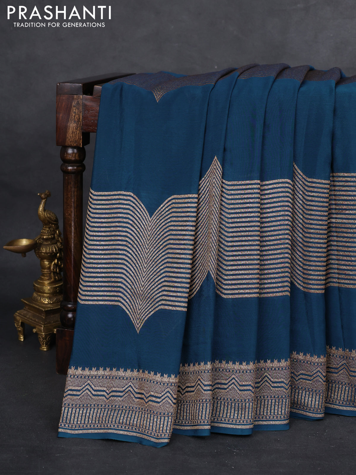 Banarasi crepe saree peacock blue with allover geometric weaves and woven border