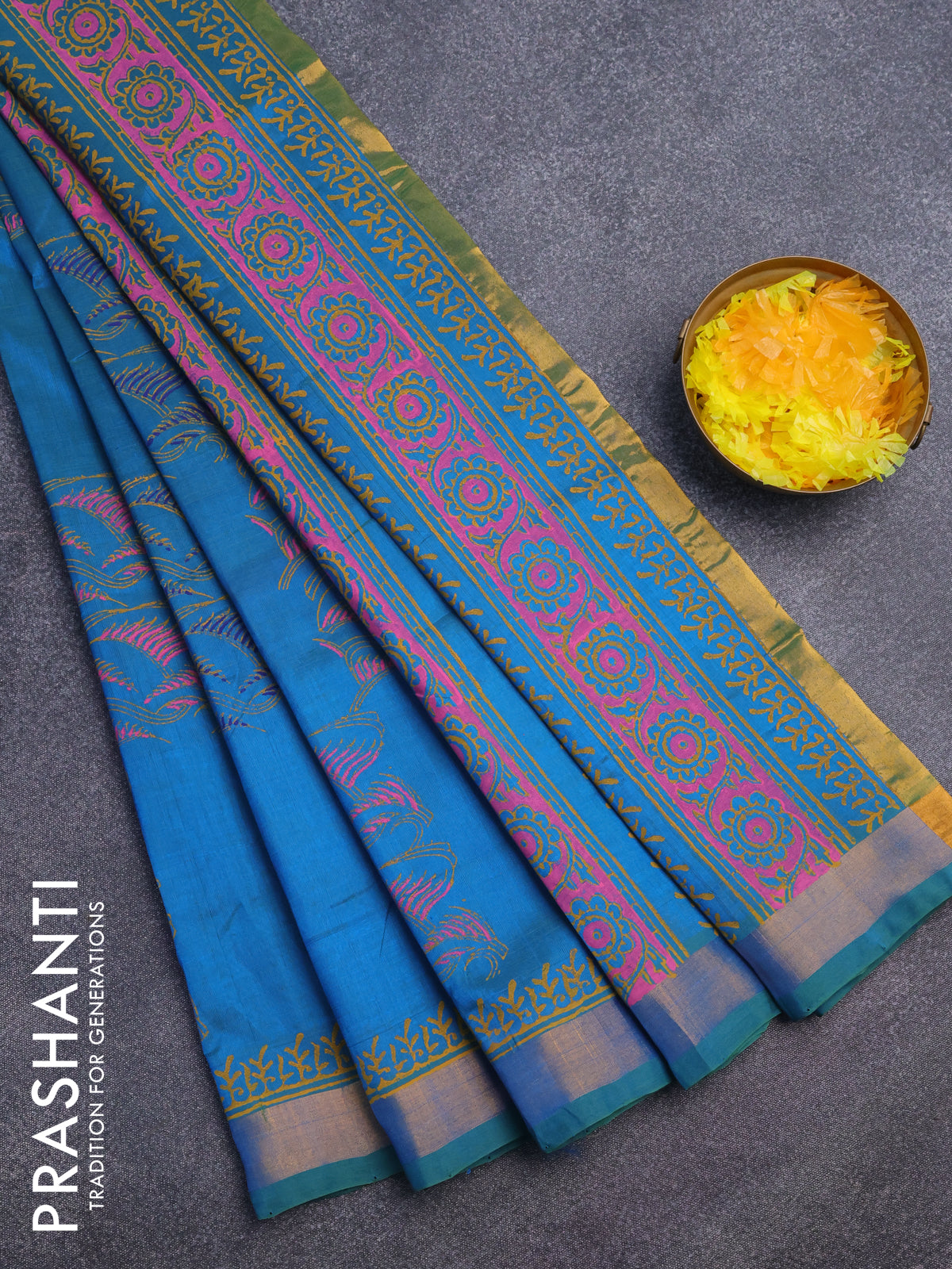 Silk cotton block printed saree dual shade of teal blue with allover prints and zari woven border