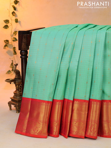 Pure kanjivaram silk saree teal green and dual shade of pink with allover zari checks & buttas and zari woven korvai border