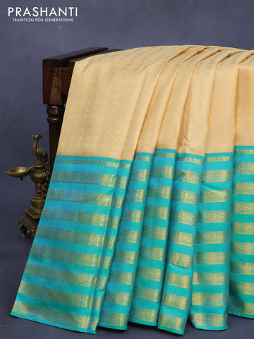 Pure kanjivaram silk saree sandal and green with allover zari woven butta weaves and long zari woven border