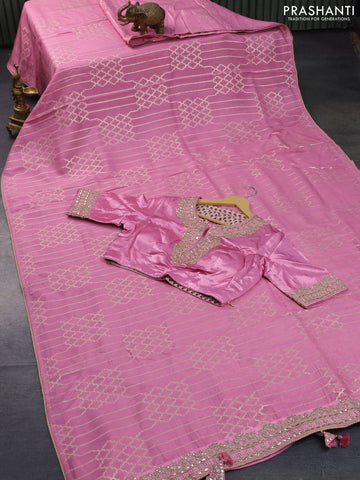 Banarasi munga tussar saree light pink with allover zari woven geometric weaves and lace work border & embroidered readymade blouse