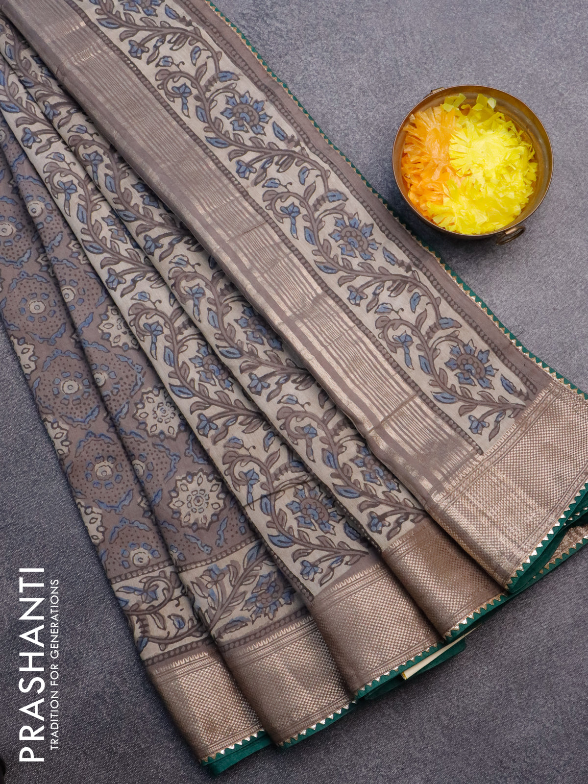 Chanderi silk cotton saree grey shade and green with natural vegetable prints and zari woven gotapatti lace border