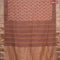 Chanderi silk cotton saree pastel peach and black with natural vegetable prints and zari woven gotapatti lace border