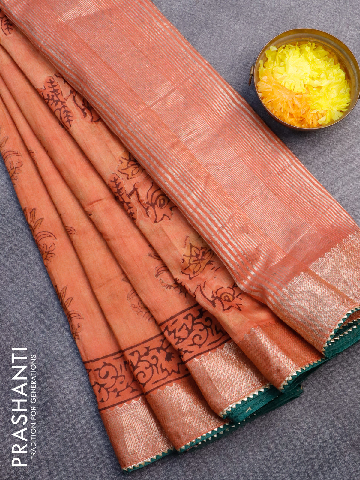 Chanderi silk cotton saree rustic orange and green with natural vegetable butta prints and zari woven gotapatti lace border