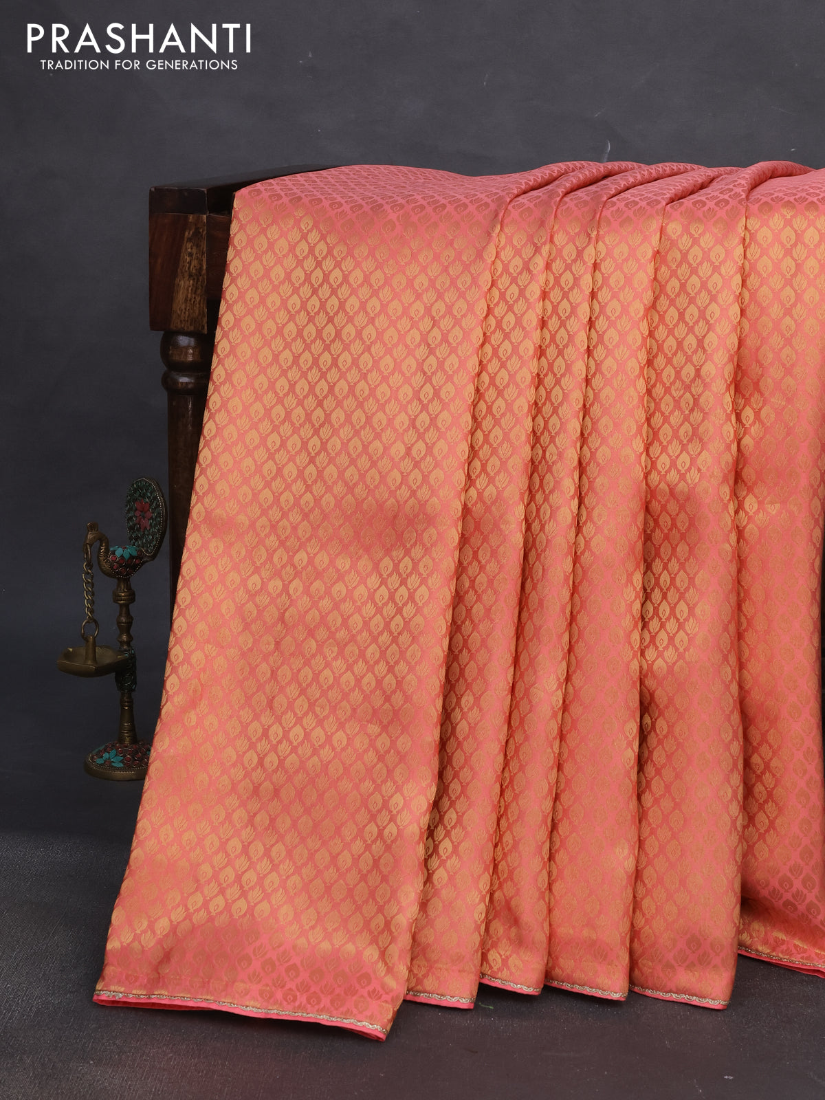 Banarasi semi crepe saree peach pink with allover zari woven brocade weaves and lace work border