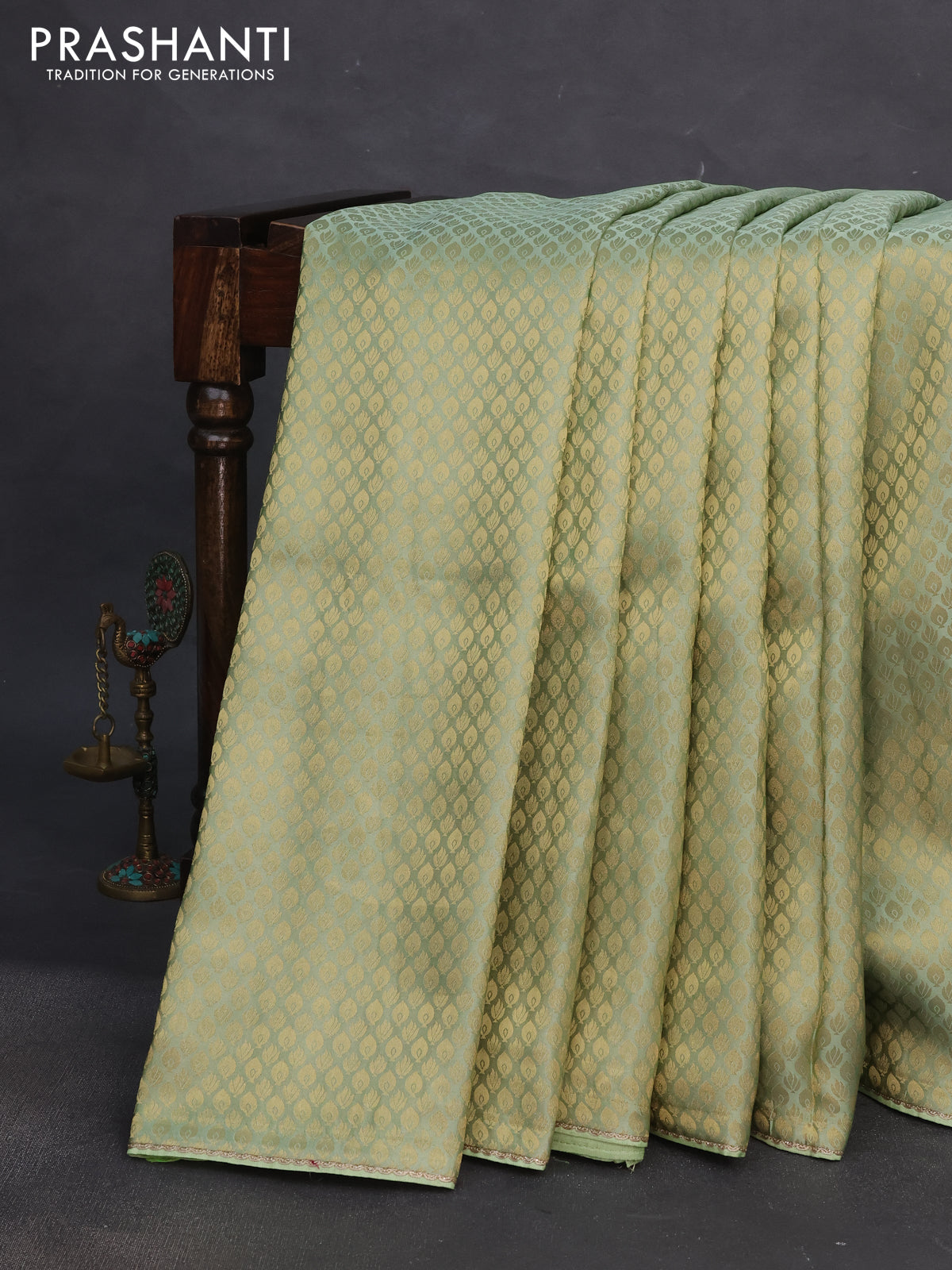 Banarasi semi crepe saree pastel green with allover zari woven brocade weaves and lace work border