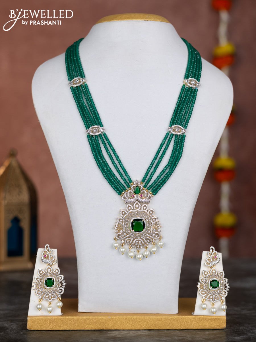 Beaded green necklace with emerald & cz stones and pearl hangings in zircon finish