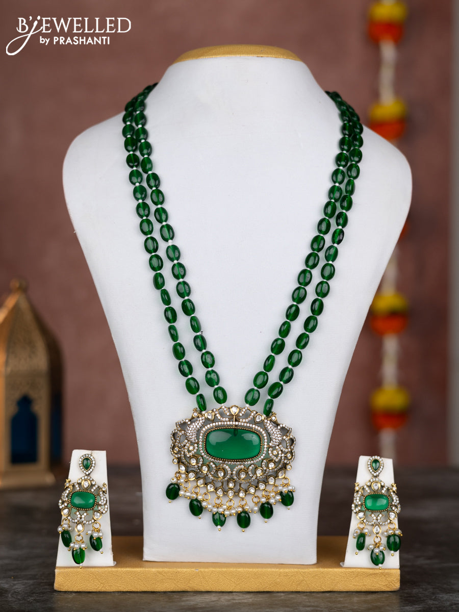 Beaded double layer green necklace with emerald kundan & cz stones and pearl hangings in victorian finish